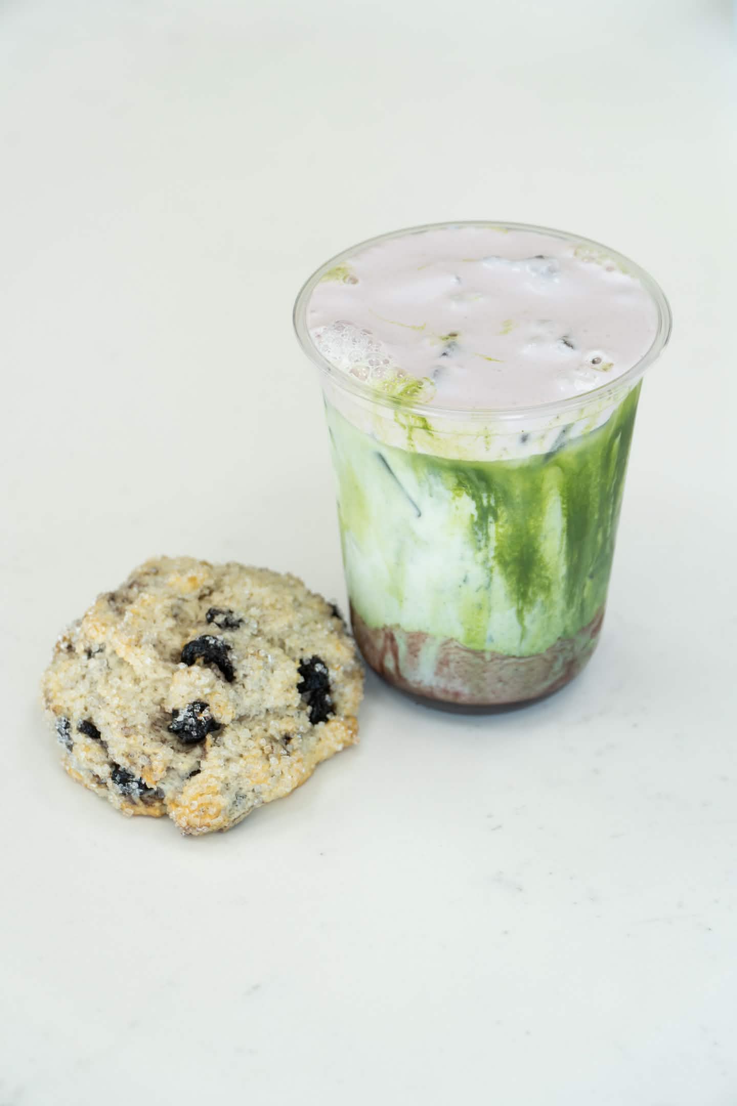 Blueberry matcha with a blueberry scone